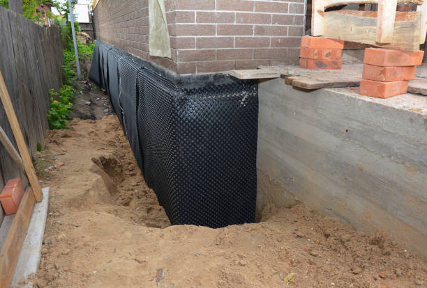 SJ Waterproofing Pros technician performing targeted Emergency Waterproofing assessment in York, SC